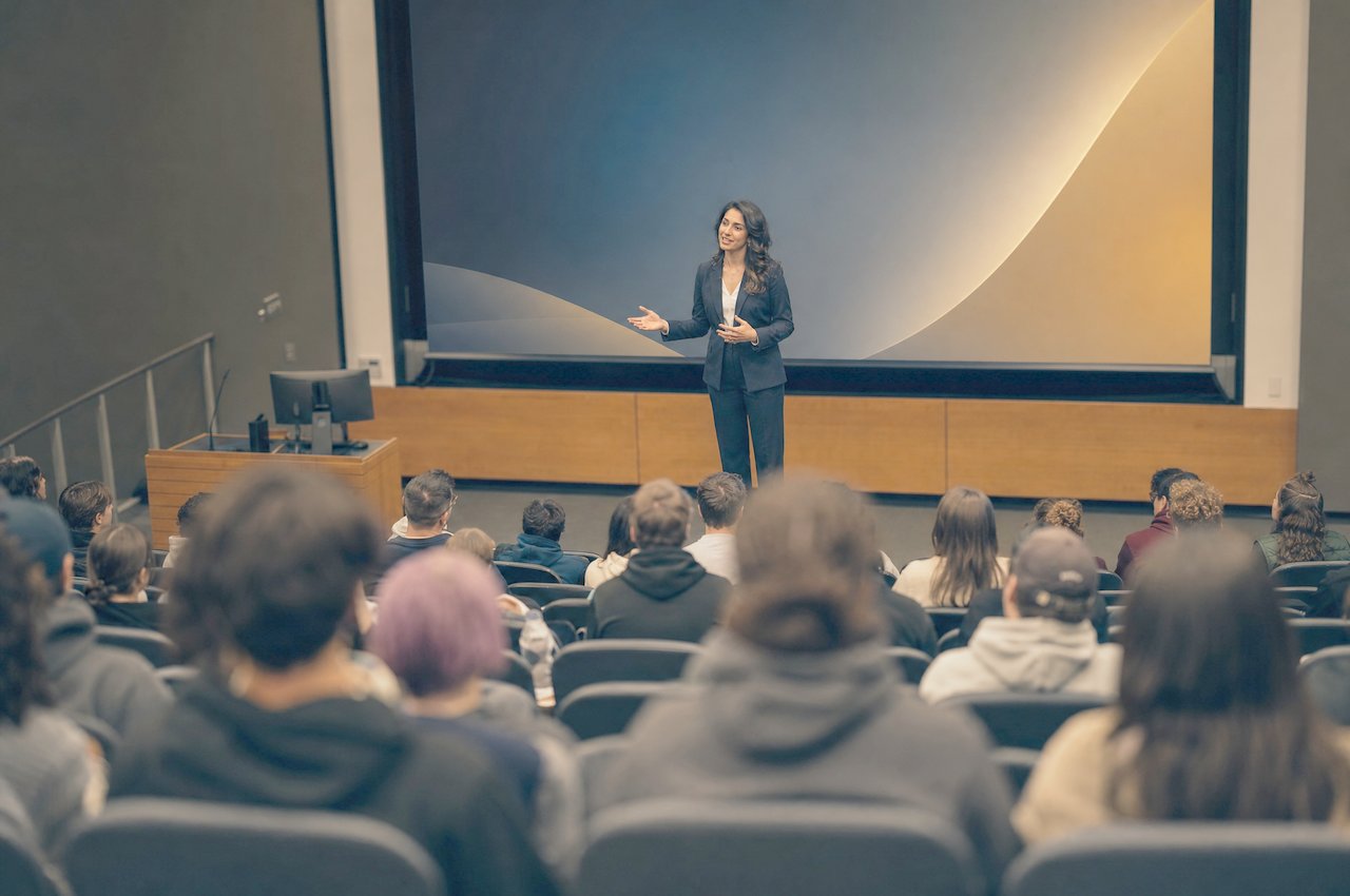 An ENC coach presents to a full lecture hall of job seekers